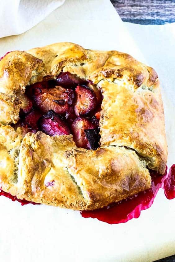 a free-form tart with roasted plums and flaky pastry