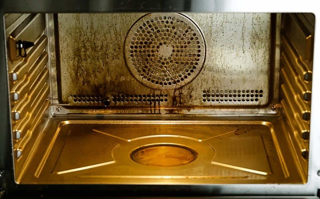 a dirty steam oven interior