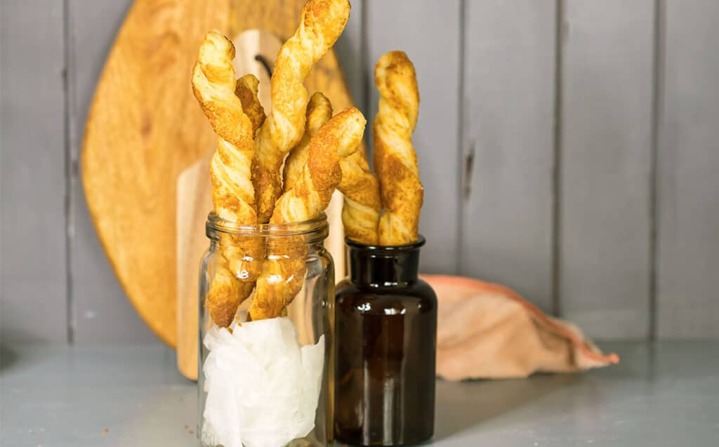 cheese straws in glass jars