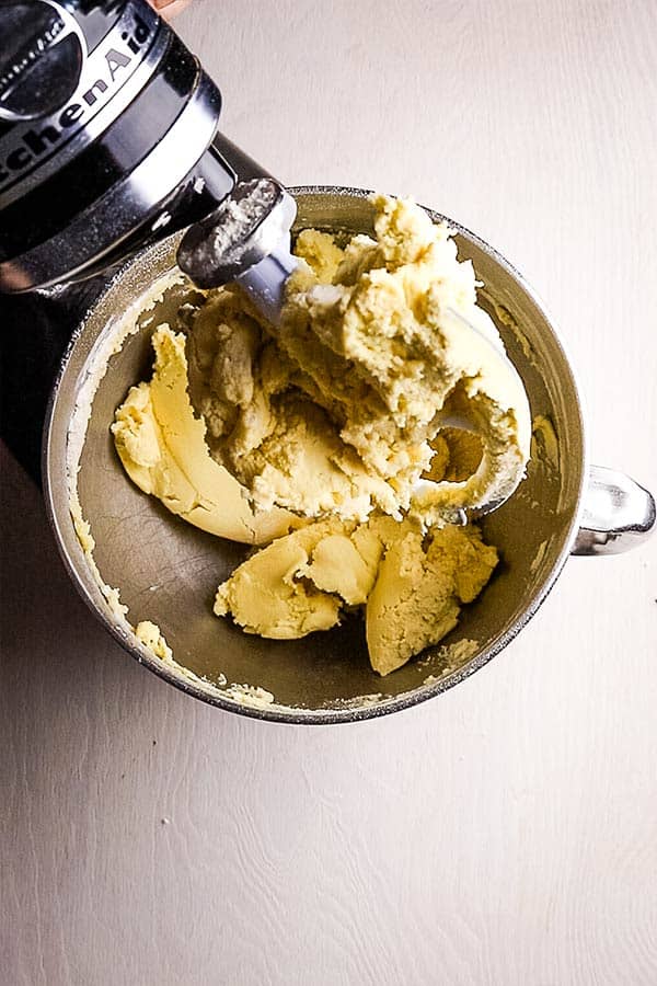 mixed shortbread dough in a stand mixer bowl