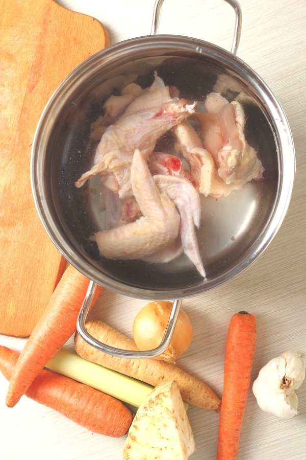 chicken wings in pot for stock