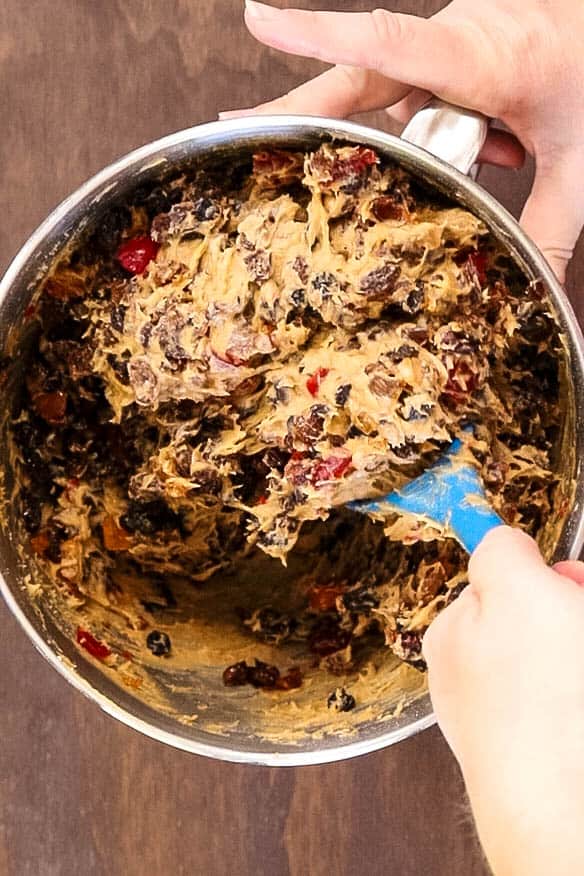 mixing dried fruits into cake batter