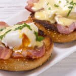 eggs benedict with Hollandaise sauce on top