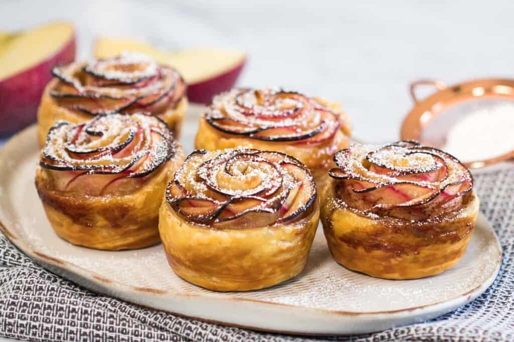 landscape view of freshly cooked apple rose with puff pastry