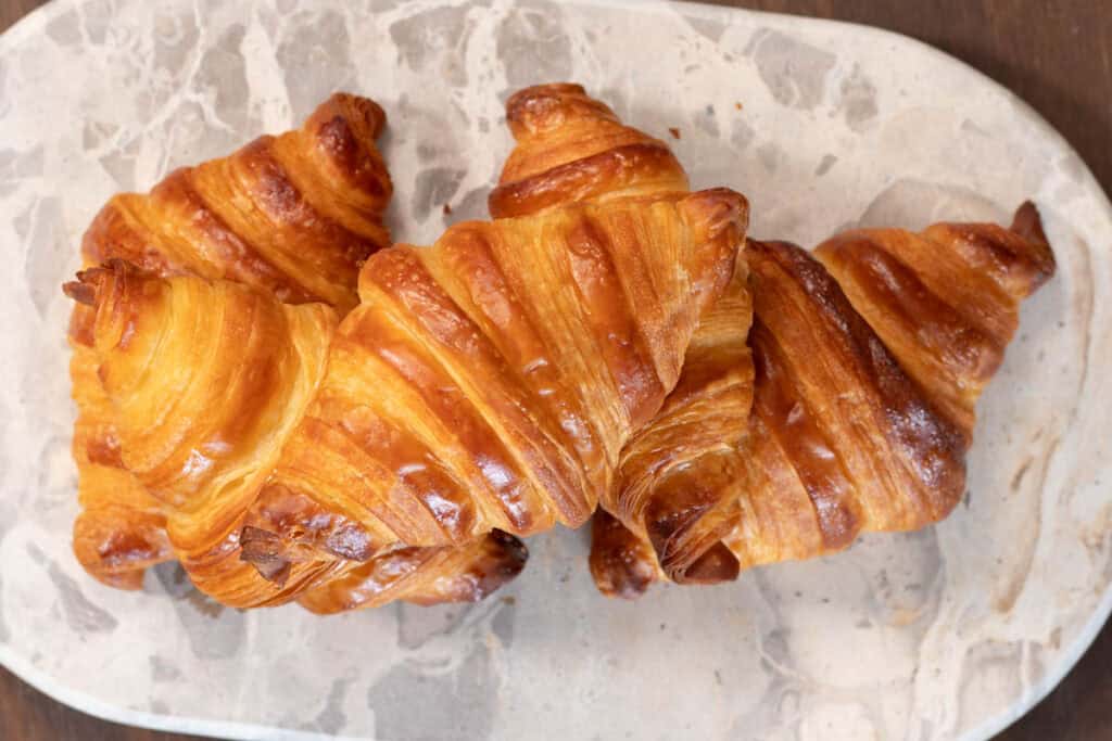 Landscape view of freshly baked croissants.