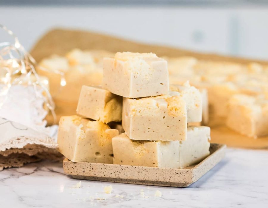 pieces of sugar cookie fudge on a small square platter