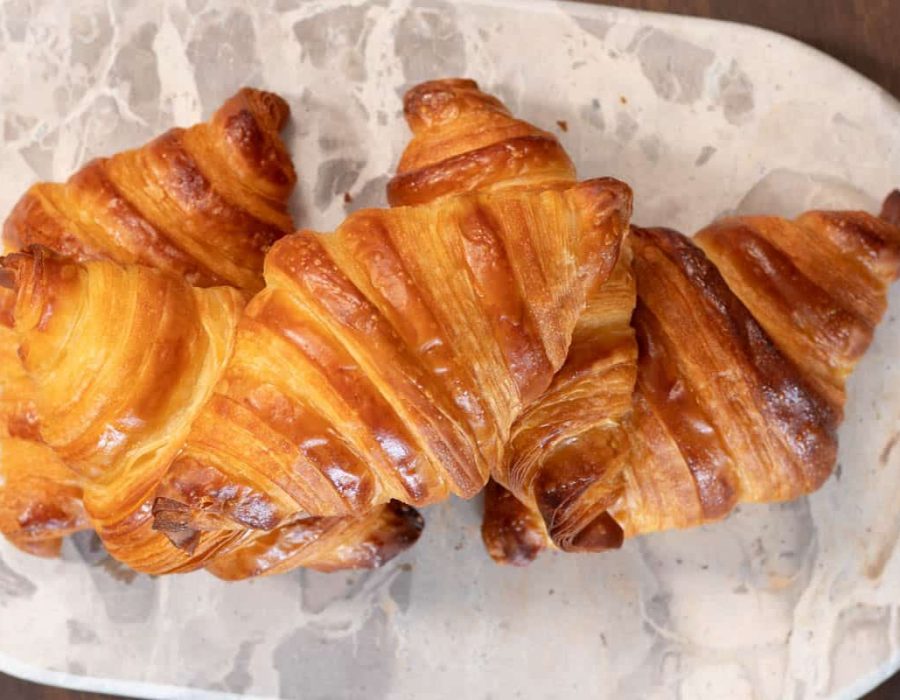 Landscape view of freshly baked croissants.