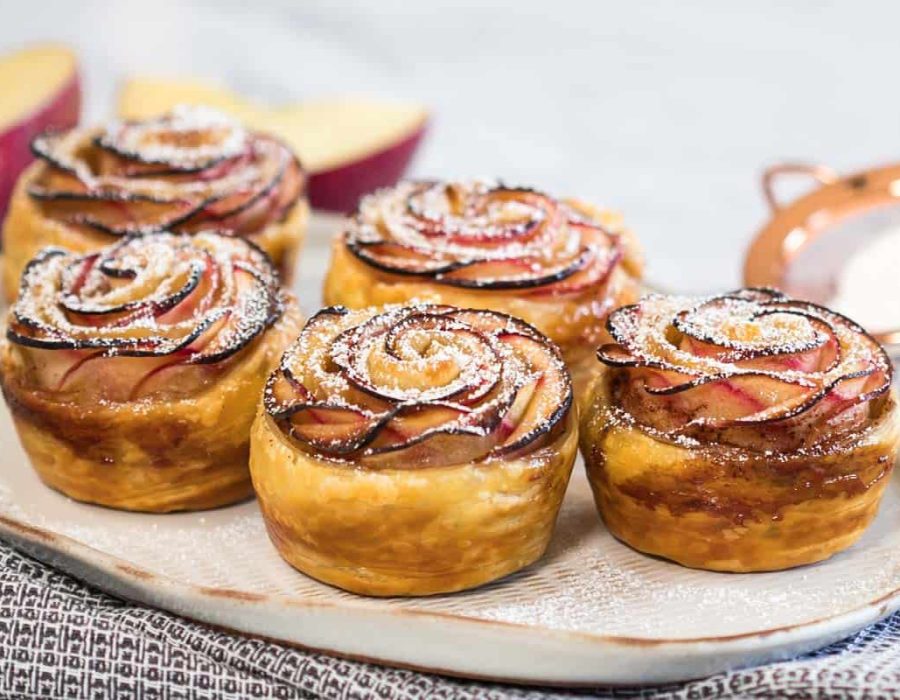 landscape view of freshly cooked apple rose with puff pastry