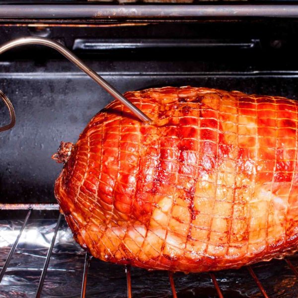 Cooked fillet of pork in the oven close up