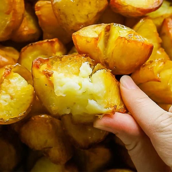 close up golden roasted potatoes