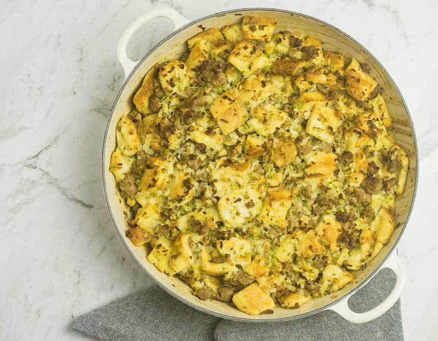 a cast iron pan of sausage and herb stuffing