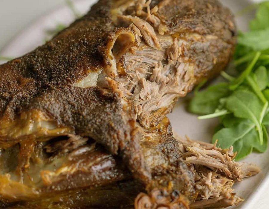 slow cooked lamb on platter